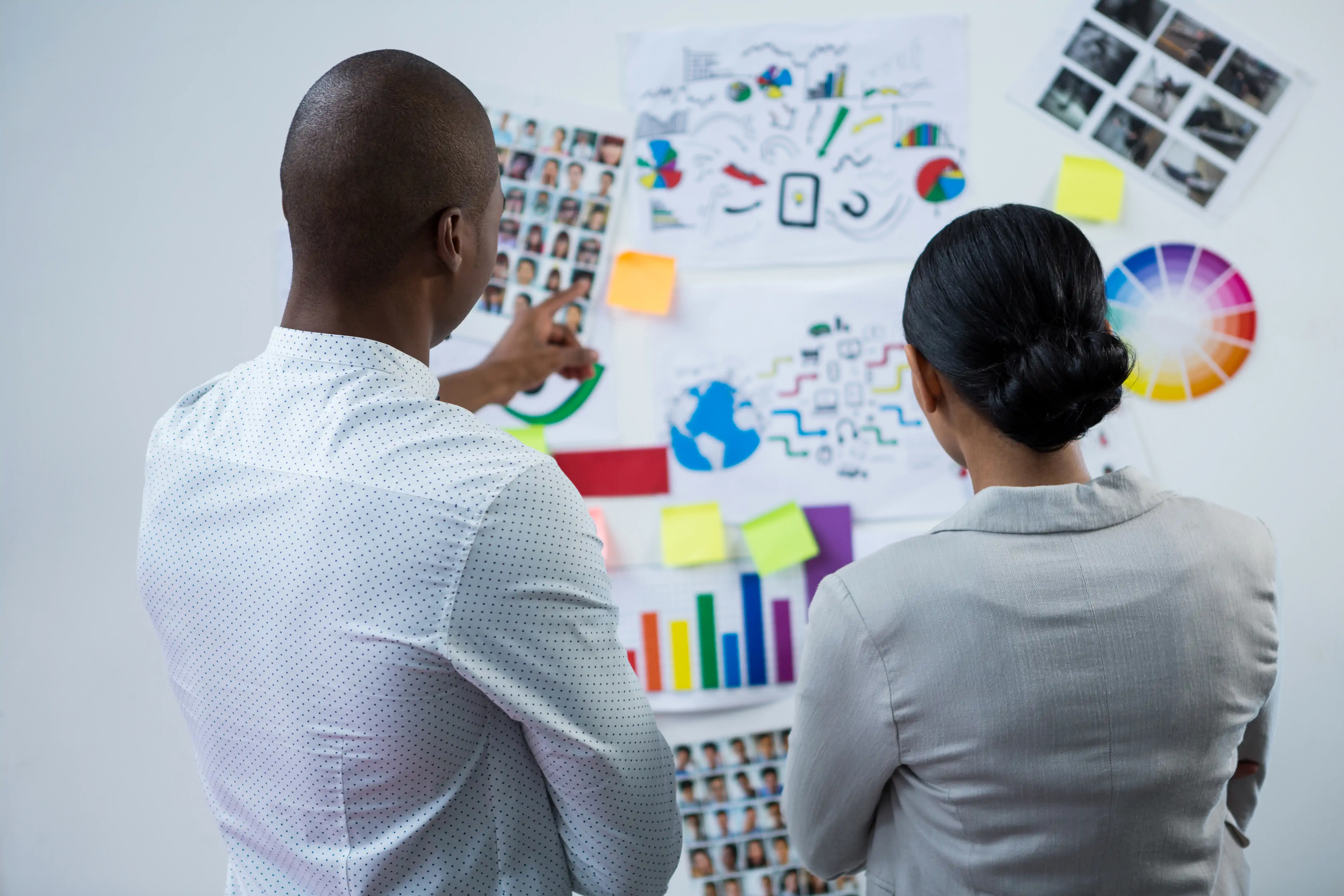 Strategists reviewing data and creative direction